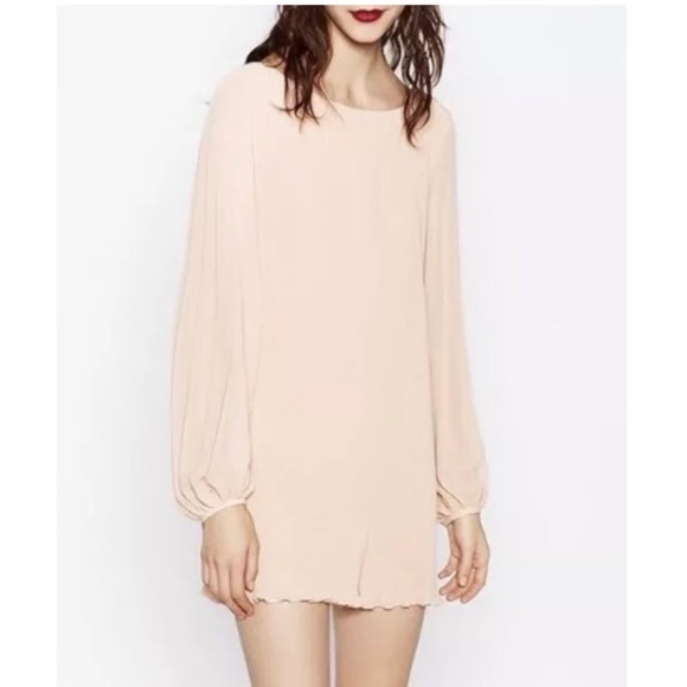 Peach colored shorts romper